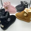 UG G Kids Australië Mini Klassieke Knoop designer Laarzen Kinderen jongens Meisjes zuigelingen Sneeuwlaarzen Bont pluizig Winter Warm Jeugd Grote Kinderschoenen Peuter Babyslofjes