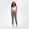 Pantalon actif doux au toucher nu Yoga Capris entraînement Sport femmes cordon taille Fitness course pantalons de survêtement avec deux poches latérales