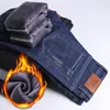 Mens jeans clássico formal lã negócios moda solta relaxada calças elásticas marca mais almofada de veludo quente 231112