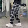 Mannen Broek Mannen Stelletje Voeten Mode Losse Zwarte Plaid Herfst Winter Verdikking Warmte Harajuku Streetwear Harem Mannelijke Broek