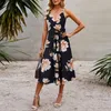 Casual klänningar kvinnor fashionabla sommarklänning wrap v nack ärmlös boho blommig spaghetti rem en linje flytande strand sundress med bälte