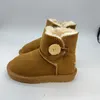 UG G Kids Australië Mini Klassieke Knoop designer Laarzen Kinderen jongens Meisjes zuigelingen Sneeuwlaarzen Bont pluizig Winter Warm Jeugd Grote Kinderschoenen Peuter Babyslofjes