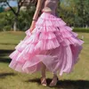 スカート2023女性高品質のピンクの非対称プリーツメッシュオーガンザ腫れを丸ごとボールガウンパーティー結婚結婚マキシスカートレディース