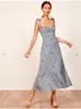 Nya avslappnade klänningar sommaren 2024 Kvinnor Spaghetti Rem Chiffon Dress Runway European Bohemian Floral Printed Midi Ruffles