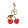 Tillbehör Bag delar Tillbehör Saker säckar Cherry Charm Handbag Pendant Keychain Womens Utsökt InternetFamous Crystal Cherry Car Acces