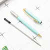 20Pcs/Lot Four Leaf Clover Ballpoint Pens Multi-color Fashion Rotating MetalClip Creative Gift Writing