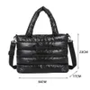 Sacos de noite inverno fofo para baixo bolsas para mulheres moda acolchoada feminina tote cor sólida designer de luxo bolsa de ombro mulher 231121