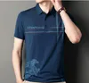 T-shirt da uomo Designer Polo stampata manica corta 2023 T-shirt casual a righe da uomo nuova estate Top a mezza manica sottile