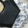 TOTE PROJEKTERY PROJEKTACJE TOBA ZACHODANIA MĘŻCZYZNA KOBIETA TORDBAGS DAMSENT Messenger Composite Bag Torbe Ramiona żeńska torebka Moda Wysoka pojemność Portfel Klasyczny alfabe