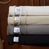 Camas de camisetas masculinas de grandes dimensões para homens roupas de manga curta 100 algodão grosso liso solto 260g mulher sólida