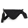 Available in all seasons Men Day Packs New nylon triangle bag women Wide shoulder strap Triangle lock earphone bags clutch black white 27x14x11cm