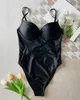 Swimwear de mujeres 2023 Sexy Black Push Up One Piece Swimsuit Women Monokini Corte sin espalda Damas Sólido traje de baño de baño Trikini