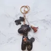 Cadeau de fête Animal porte-clés fleur pendentif Collection voiture porte-clés fer à cheval boucle cheveux boule sac pendentif pour hommes et femmes