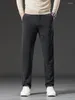 Męskie spodnie 2023 jesienne zima solidne szczupłe dżinsy bawełniane proste wygodę swobodne dżinsowe biuro biznesowe