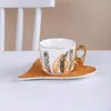 Ensemble de tasses et assiettes en céramique avec plumes d'ange de 200ml, tasse à café de luxe européenne, soucoupe pour le thé de l'après-midi à la maison, tasse exquise