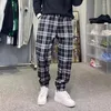 Mannen Broek Mannen Stelletje Voeten Mode Losse Zwarte Plaid Herfst Winter Verdikking Warmte Harajuku Streetwear Harem Mannelijke Broek