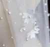 Elegante velo da sposa con applicazioni di perle fiori bordo tagliato lunghezza cattedrale uno strato tulle veli da sposa hotselling V679