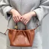 Lady Luxury Handbag Drawstring Tote Bag Women Designer Ce Classic Big Logo T-Shaped Shoulder Fashion Bags Brown Women Purse Soft Leather High Qualty 22Cm