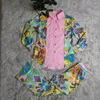 レディースツーピースパンツChyxsb 2023 Street Casual Ladies Spring and Summer Fashion Printed Lengeve Lapel Shirt 2セット