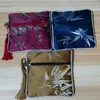 Personnalisé bambou tissu fermeture éclair bijoux pochette Bracelet cadeau sacs petit chinois soie brocart gland porte-monnaie en gros 50 pcs/lot