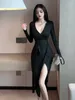 Casual Kleider WOMENGAGA 2023 Schwarz V-ausschnitt Langarm Split Kleid Elegante frauen Sexy Mode Süße Koreanische Frauen Tops HJ8W