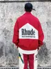 Designerkläder Fritidsrockar Trendiga Rhude Färg Kontrast Patchwork Jacka Herr Pill Dragkedja High Street Trench Coat Lös Sport Streetwear sport vindjacka