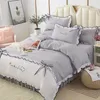 Set di biancheria da letto Net Celebrity Stile coreano Trapunta in pizzo Gonna da letto Quattro pezzi in puro cotone più biancheria da letto Princess.