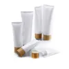 Tubos de plástico brancos vazios para apertar frascos de creme cosmético recarregável para viagem recipiente de bálsamo labial com tampa de bambu Rcnhe