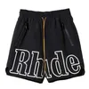 Designer Kleding Rhude Trend Merk Reflecterende Brief Shorts Bedrukt High Street Trekkoord Losse Casual Split Broek Heren Koppels Joggers Sportkleding Strand fitness