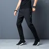 Pantaloni da uomo 2023 pantaloni oversize tinta unita in velluto a coste con gamba con cravatta da uomo caldo streetwear coreano per l'uso quotidiano