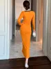 Casual jurken 2023 Spring y2k sexy jurk vrouw oranje uitgesneden holle lange mouw geplooide magere gesplitste gewaad femme feest straatvestidos