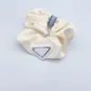 Eenvoudige haardie nylons dames rubberen band dame dikke handgemaakte haaraccessoires driehoeken thuis sieraden meisjes 8-12 designer scrunchies geëmailleerd zb055 f23