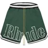 Designerkläder Rhude Mesh Basketball Andas tryckt band Patchwork Sport Dragsko High Street Lösa shorts Par Joggare Sportkläder Strand fitness