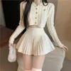 Kjolar houzhou elegant ylle veckade minikjol kvinnor söt höst vinter koreansk mode hög midja solid a-line sexig kort 230422