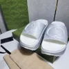 Kvinnors designer tofflor lichee mönster sommar platt botten bokstav sandal tofflare flip flops lyxig fast färg utomhus strand sandaler 83gl