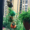 Ensemble de quatre pièces de pot de fleur suspendu en céramique perméable à l'air balcon pot de plante mural suspendu jardinière en céramique pastel rustique Y2242L