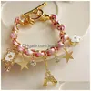 Braccialetti con ciondoli Braccialetti con ciondoli di moda per le donne Stella d'oro Cristallo Torre Eiffel Poker Fiore Bracciale Donna Bracciale con corda in pelle intrecciata B Dhyhl