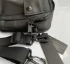 男性のトレンディなシングルショルダーパッケージスモールマルチファンクション1つのメガネメッセンジャーバッグ携帯電話バッグCPレンズトートファッションチェストパック380
