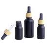 Matte Black Glass e liquid Essential Oil Perfume Bottle with Reagent Pipette Dropper and Wood Grain Cap 10/30ml Mudvm