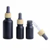 Matte Black Glass e liquid Essential Oil Perfume Bottle with Reagent Pipette Dropper and Wood Grain Cap 10/30ml Mudvm