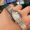 Orologi da polso Orologio da donna con cinturino in acciaio intarsiato con diamanti alla moda Orologio da donna al quarzo serpente Argento Prestazioni impermeabili 50 m