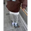 Kjolar 2023 Autumn Vintage Korean Retro High Street randig stickad låg midja Lång kjol Streetwear -mode