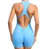 Yoga-outfit 2023 Pad mouwloos vest Oefening crop-set jumpsuit Dames Sport Gym Workout Fitness Scrunch Shorts Actieve rompertjes 231121