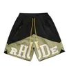 Ropa de diseñador Rhude Carta Impreso Contraste Color Patchwork Shorts High Street Trendy Brand Pantalones sueltos de cinco piezas Hombres Parejas Joggers Ropa deportiva