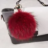 Porte-clés de luxe 15cm moelleux boule de fourrure de raton laveur porte-clés réel Pom porte-clés pompon porte-clés charme femmes sac pendentif décembre