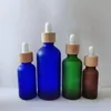 Frascos conta-gotas de óleo essencial de vidro fosco Azul âmbar verde frasco de soro com tampa de pipeta de reagente de bambu 10ml 20ml 30ml 50ml 100ml Nohfo