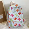 Школьные сумки женский рюкзак мода мода бабочка цветочный рисунок эстетические рюкзаки рюкзаки нейлона девочка для отдыха.