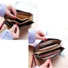 Plånböcker Kvinnors vintage oljevaxläder dragkedja handväska bank stor kapacitet noll plånbok handledsrem enkla namn påsar korthållare