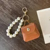 Nyckelringar söta mini -mynt Purses Pearl Chain Keychain Imitate Key Ring Small Earphone Box Pu Leather Bag Pendants Ins