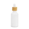 Bottiglie di olio essenziale in vetro porcellana bianca Flacone contagocce per siero per la cura della pelle con pipetta in bambù 10ml 15ml 20ml 30ml 50ml 100ml Dfplm